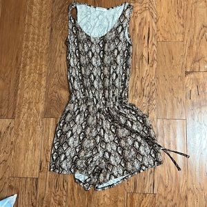 Worn twice. Super soft and comfortable. No longer fits. Very Stretchy.